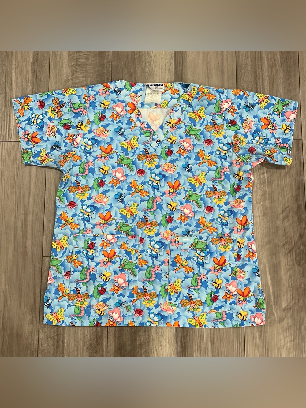 Landau Blue Cartoon Insect and Floral Print V-Neck Scrub Top